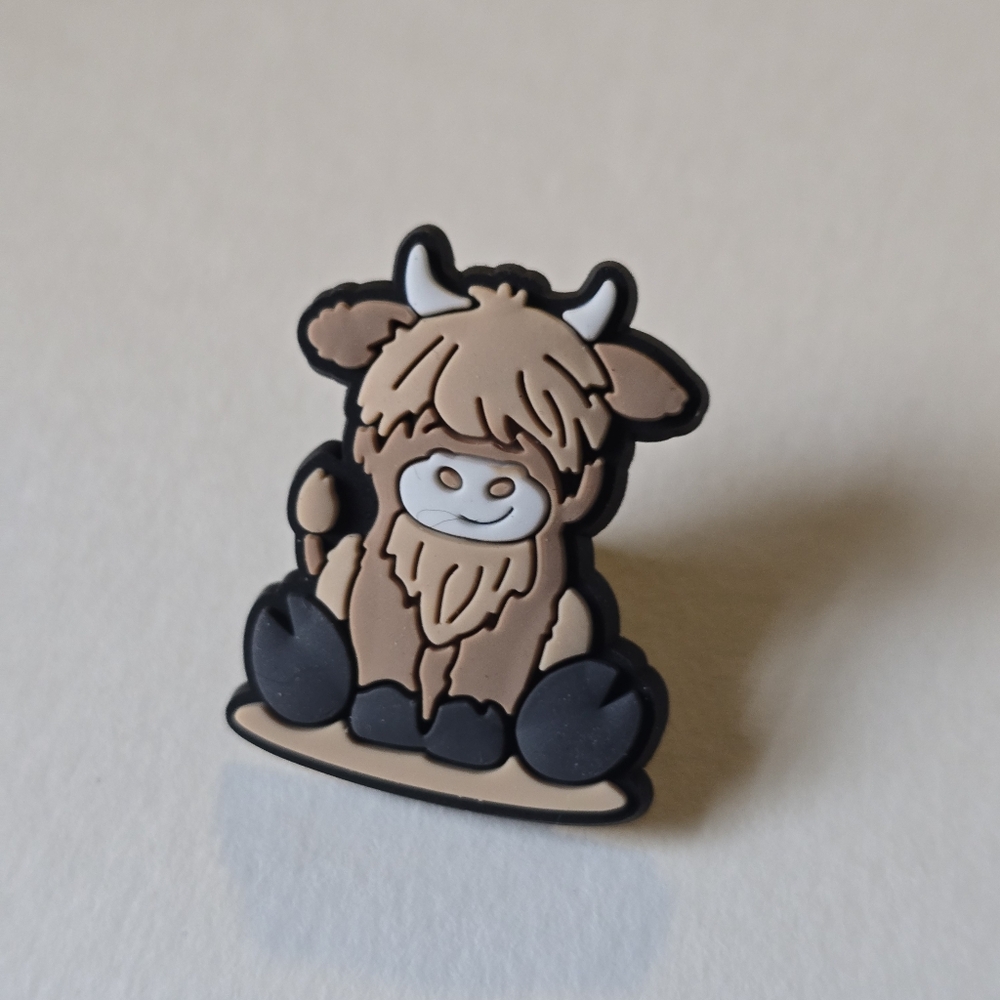 Brown and Black Cow Pin